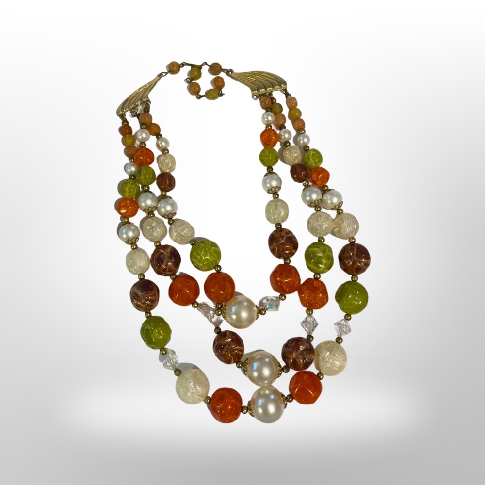 Vintage triple strand of beads with matching earrings clip on